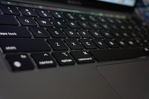 where is the power button on a MacBook Pro?